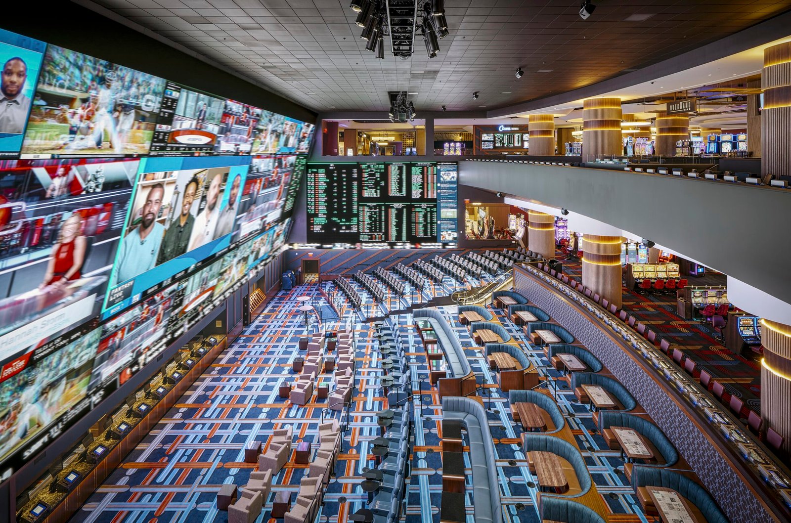 Interior of Circa Sportsbook in Las Vegas, with video wall, odds boards, seating, and gaming floor