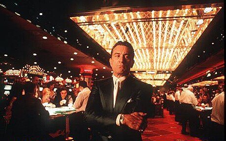 Frank Rosenthal standing in a casino gaming room.
