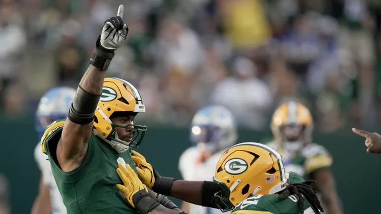 Green Bay Packers players celebrate during their Week 1 game against the Detroit Lions.